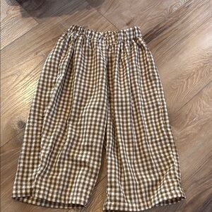 Brown gingham pants.